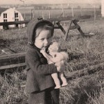 With favorite doll, c. 1947
