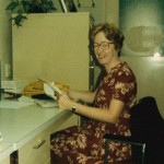 At the desk in Alumni 9, her office for 31 years, October 1984